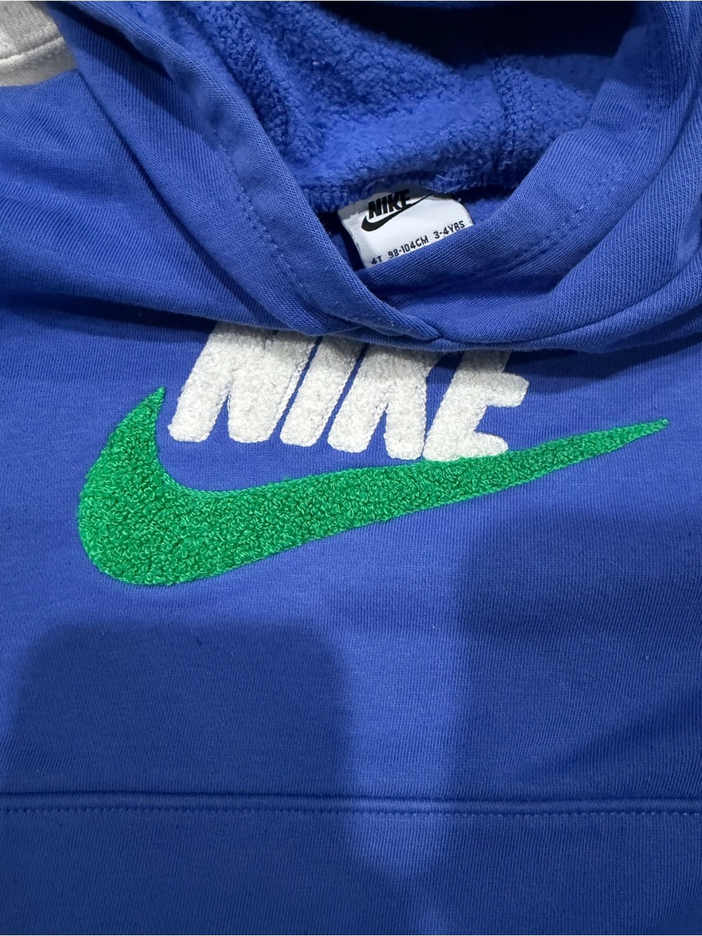 Nike Kids Royal Blue Hoodie with Green Swoosh and White Logo
